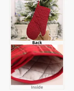 Close-up of Christmas oven mitt with red plaid trim and thick quilted lining detail