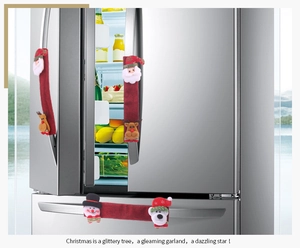 Detail of three Christmas refrigerator handle covers with 3D Santa and reindeer plush figures