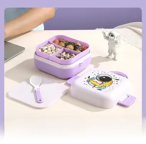 Detail of layered lunch box with cute astronaut pattern and included folding spoon