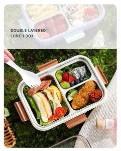 Escena de picnic con una fiambrera bento de acero inoxidable 304 de doble capa y 3 divisiones