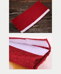 Detail of red burlap microwave handle cover with strong white hook and loop closure