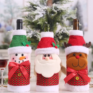 Detailed knit Christmas wine bottle covers featuring Santa, snowman, and reindeer designs
