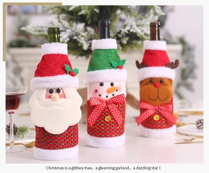 Detailed view of Christmas wine bottle covers featuring Santa, Snowman and Reindeer motifs