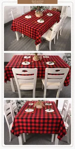 Close-up of red and black buffalo plaid Christmas tablecloth in a home dining setting