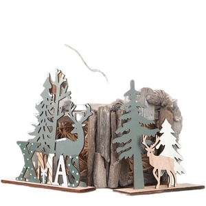 DIY wooden Christmas tree and reindeer decoration with XMAS letters and natural wood bark