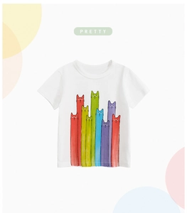 Detail of white cotton kids T-shirt featuring colorful cartoon cat graphics and round neck