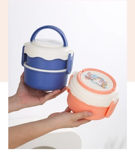 Detail of round bento boxes with unicorn design and secure side locking clips