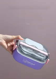 Detail showing the leak-proof pink side buckles and purple lunch box body with cartoon logo