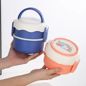 Dual-layer round bento box with handle and cartoon astronaut print in navy blue