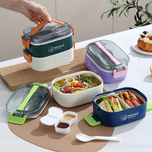 Double-layer oval bento lunch box with stainless steel liner and utensil storage compartment