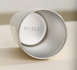 Detailed macro view of food-grade SUS304 stainless steel interior with material stamp