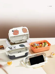 Detail of 3-compartment bento box with built-in cutlery holder and phone stand