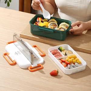 Dual-layer bento box with compartments and built-in phone holder in dark green and white