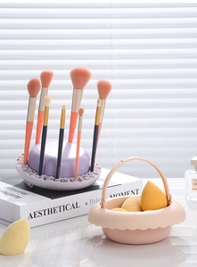 Portable makeup brush organizer stand and beauty blender drying basket in soft pastel colors
