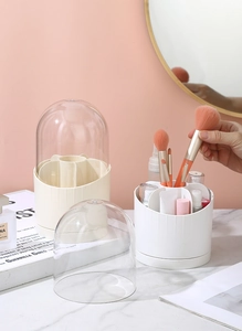 Roterende make-up borstelhouder met stofdeksel en witte vakken voor cosmetica