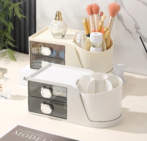 Detail of cosmetic organizer with silver bear handles and rotating makeup brush holder