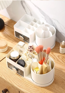 Detail view of drawer organizer with rotating brush holder for vanity storage