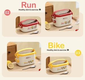 Detail view of double-layer stainless steel lunch boxes with cartoon prints and handles
