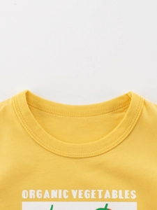 Kids organic cotton yellow T-shirt with vegetable print and ribbed crew neckline