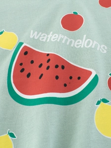T-shirt estiva da bambina con stampa di anguria e limone su tessuto verde chiaro