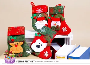 Detail of four Christmas stockings featuring 3D Santa, Snowman, Reindeer, and Bear designs