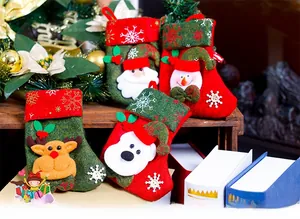 Detail of four Christmas stockings featuring 3D Santa, Snowman, Reindeer, and Bear designs