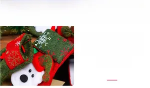 Detailed view of mini Christmas stocking with snowflake pattern and cartoon character