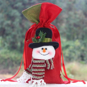 Christmas burlap gift bag with 3D snowman character and festive red drawstring closure