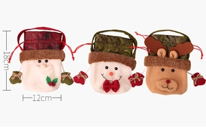 Detailed view of Christmas gift bags featuring Santa, snowman and reindeer 18x12cm size