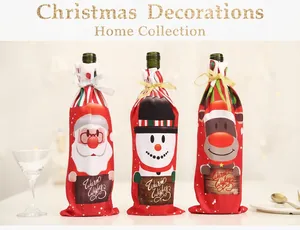 Detailed view of Christmas wine bottle covers with Santa, snowman and elk cartoon motifs