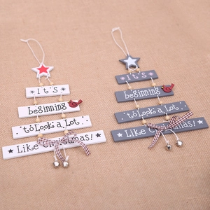 Wooden Christmas tree ornaments set with star toppers, red birds and jingle bells