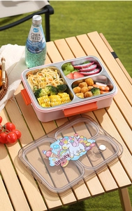 Buitenaanzicht van een roze 3-vaks roestvrijstalen lunchbox met eenhoorndeksel