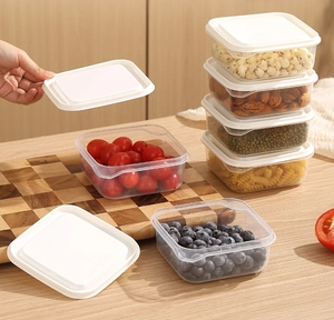 Stackable food storage containers for fridge, showing fresh berries and nuts in details