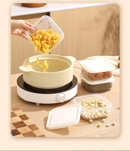 Detailed view of clear food storage containers with airtight lids in a modern kitchen