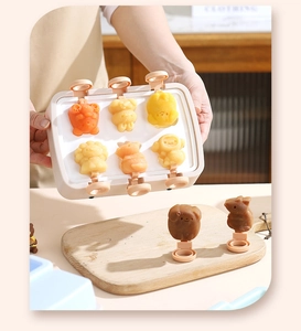 Detailed view of pink silicone popsicle mold with six cute 3D cartoon animal shapes