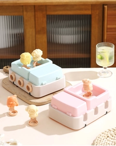 Detail of car-shaped silicone popsicle molds with cartoon animal sticks for DIY ice cream