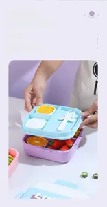 Detail view of 304 stainless steel lunch box showing dividers and utensil storage slot