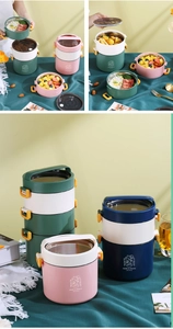 Detailed view of stackable insulated lunch boxes with stainless steel liners and secure buckles