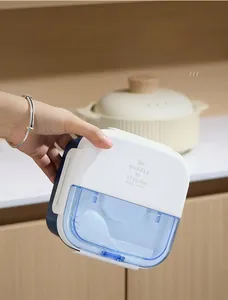 Leakproof test of the double-layer lunch box showing secure seal and portable design