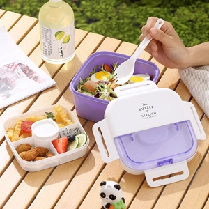 Portable double-layer purple bento lunch box with utensils for outdoor picnic use