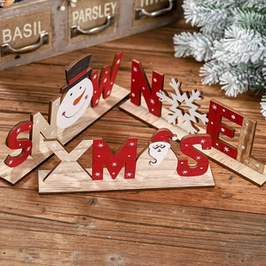 Set di 3 decorazioni natalizie in legno con scritte Noel, Snow e Xmas per la tavola