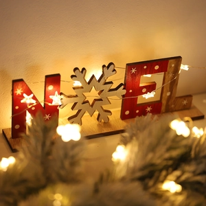 Decorazione natalizia NOEL in legno con luci LED a stella e motivi a fiocchi