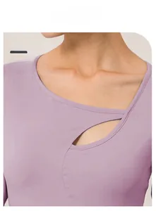 Detail shot of asymmetric neckline and hollow out design on lavender yoga long sleeve top