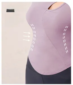 Detail of light purple yoga top featuring curved hem and irregular cutout neckline