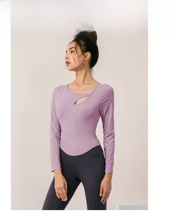 Detail of lavender long-sleeved yoga top featuring a stylish front cutout and slim fit