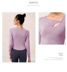 Detail of lavender yoga top featuring asymmetric cutout neck and slim fit long sleeves