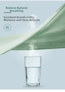 Tissu de yoga vert clair respirant montrant l'évacuation de l'humidité et de chaleur