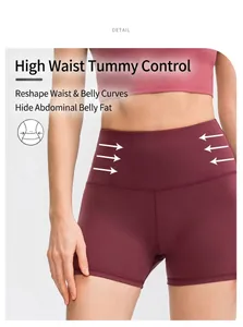 Detailed macro view of the high-waisted wide waistband on dark red yoga shorts