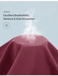 Detail showing highly breathable moisture-wicking fabric on burgundy yoga shorts