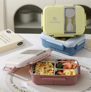 Macro view of a 3-compartment 304 stainless steel lunch box with utensil storage
